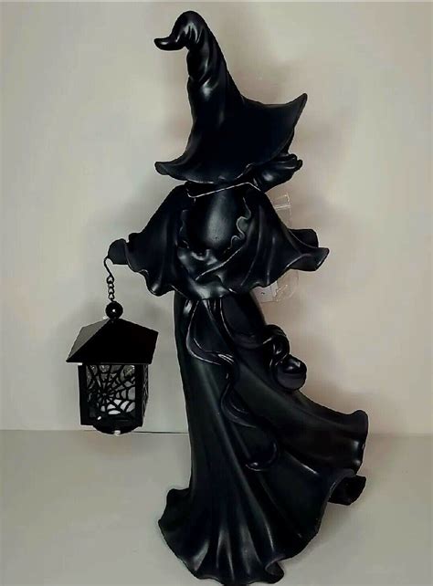 Create a bewitching centerpiece with Cracker Barrel's witch figurines